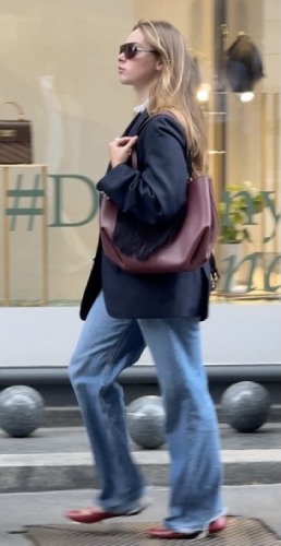 jeans, a red ballet flat, a navy coat