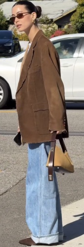 oversized suede blazer layered over a crisp white baby tee