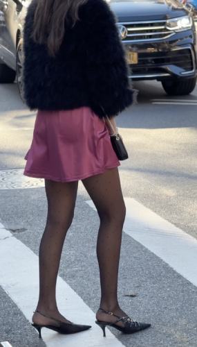 luxurious fur coat and sheer black tights